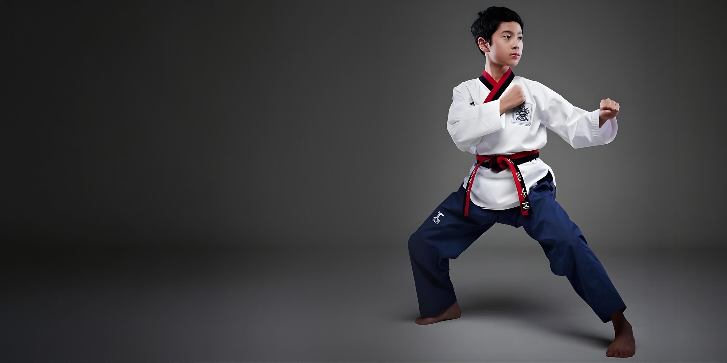 Taekwondo athlete in ready stance for coverage package